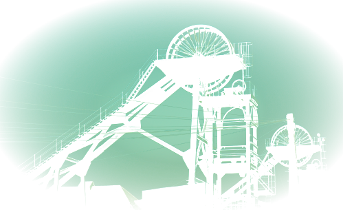 Winding gear at a disused mine juts up into the sky..