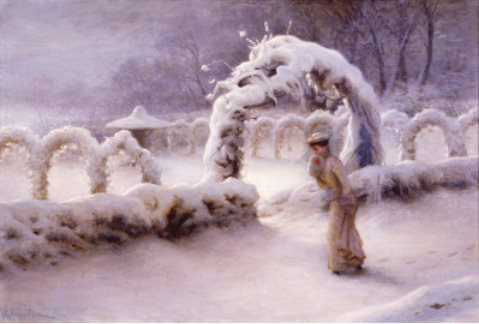 A woman walks past a snowy garden