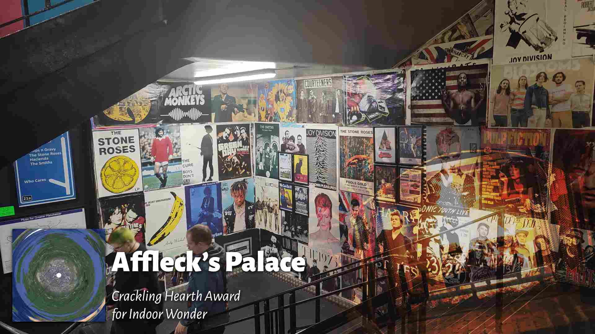 A stairwell covered in music posters