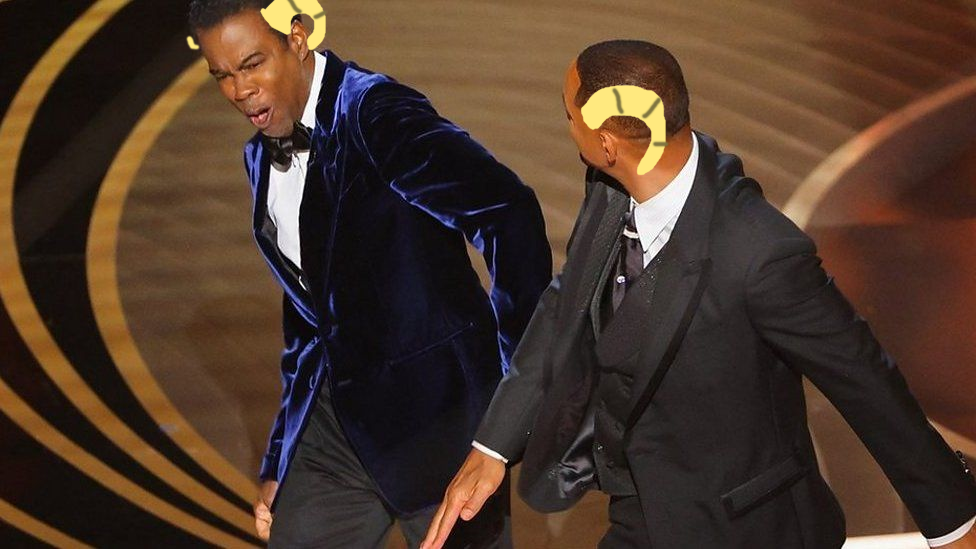 Will Smith slapping Chris Rock, but they both have ram’s horns crudely drawn on