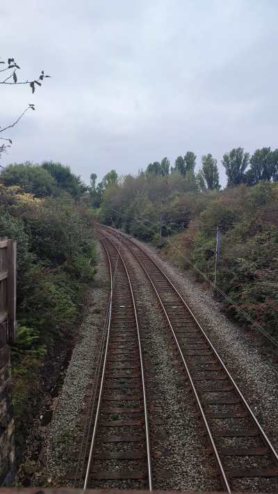 Twin rail tracks stretch into the background.