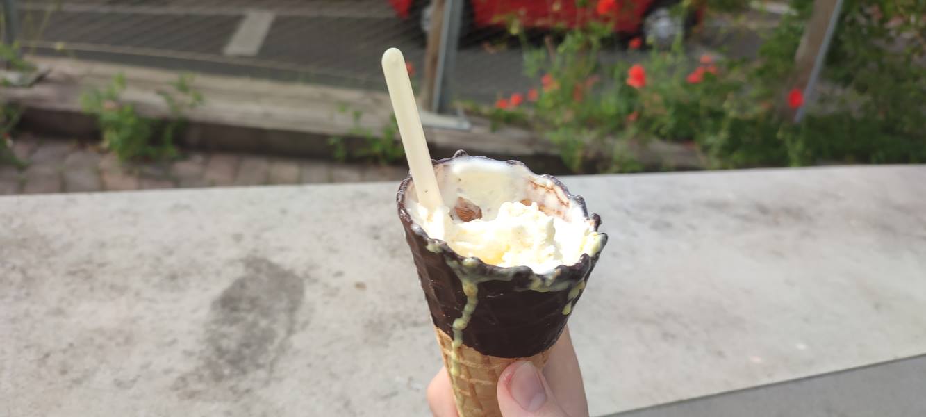 Your author’s hand holds a nice ice cream.