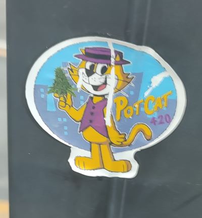 A sticker of Top Cat smoking weed labelled 'Pot Cat' (no, really)
