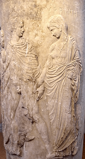 A carving of Hermes guiding someone to the underworld.