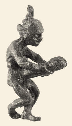 A mediæval bronze figurine clutching its comically large, erect phallus.